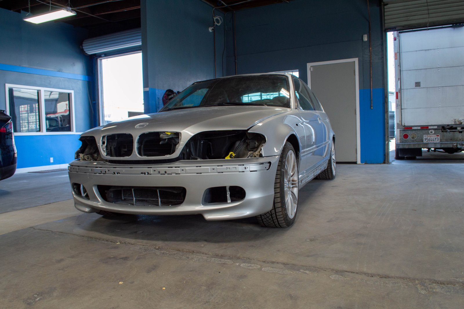 Completed collision repair — front-end damage restored on sedan at Viet Auto Collision Garden Grove
